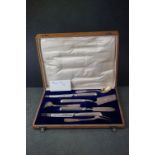 A cased Russian hallmarked silver serving set contained within original wooden fitted box.