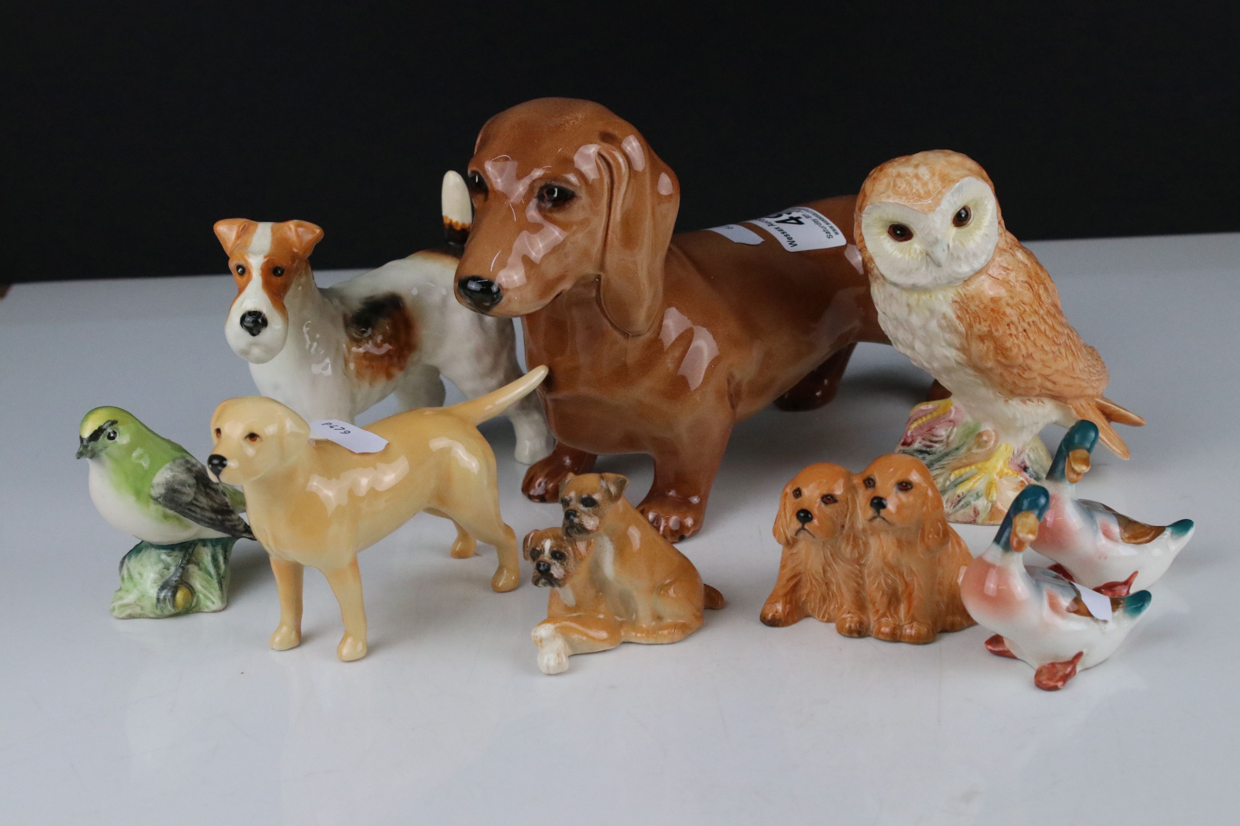Collection of Nine Beswick Animals including Dachshund 361, Wired Haired Terrier 963, Labrador 1956,