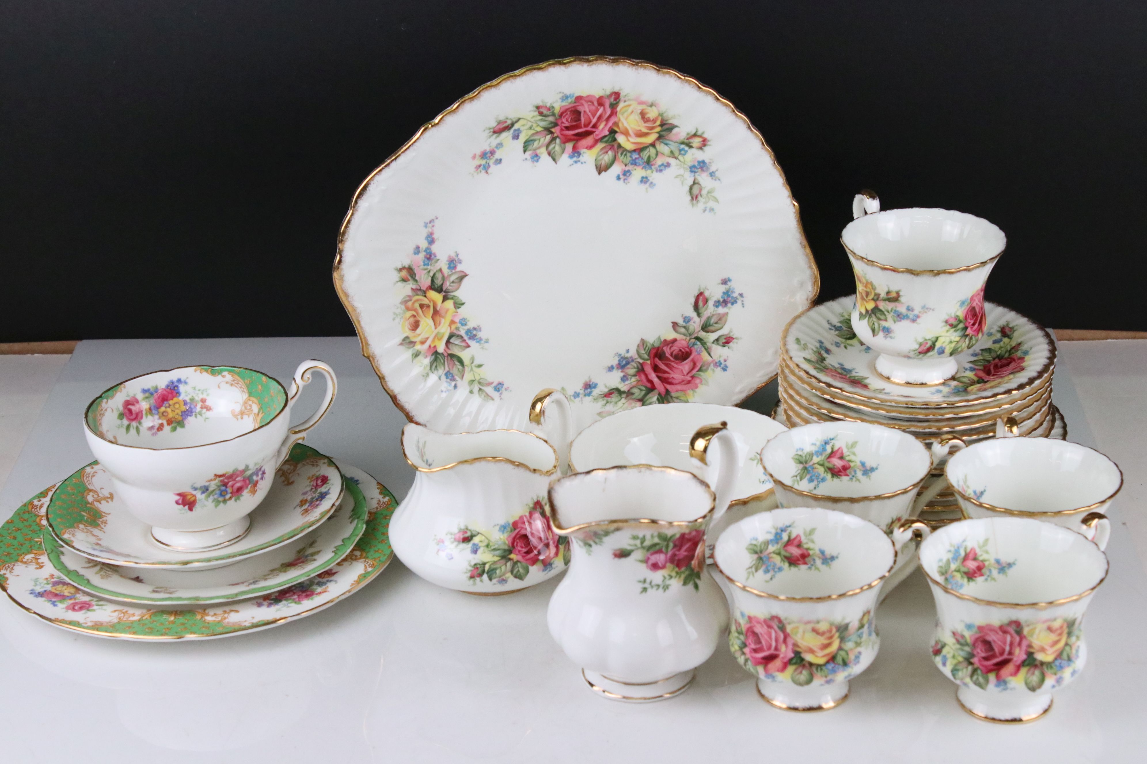 Two Part Paragon Tea Sets including Grandma Roses ( 5 tea cups, 6 saucers, 6 tea plates and sandwich