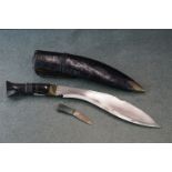 A Gurkha kukri knife complete with original scabbard.