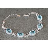 Silver, CZ & blue topaz bracelet