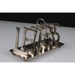 White Metal Stationery Rack in the form of the word ' Letters ', 20cms long