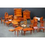 Collection of wooden dolls house furniture