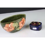 Two items of Moorcroft including Flower Trough / Vase in the hibiscus pattern with impressed mark