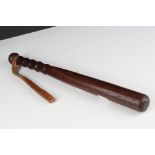 Mahogany Truncheon with ringed handle, 40cms long