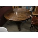 19th century Rosewood Breakfast Table, the circular tilt top raised on a column support carved