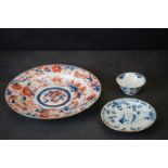18th century Porcelain Imari Plate, 23cms diameter (a/f) together with Blue and White Tea Bowl