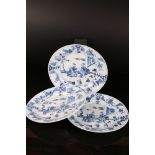 Three Chinese Blue and White Plates, Kangxi period, decorated with figures, 23cms diameter