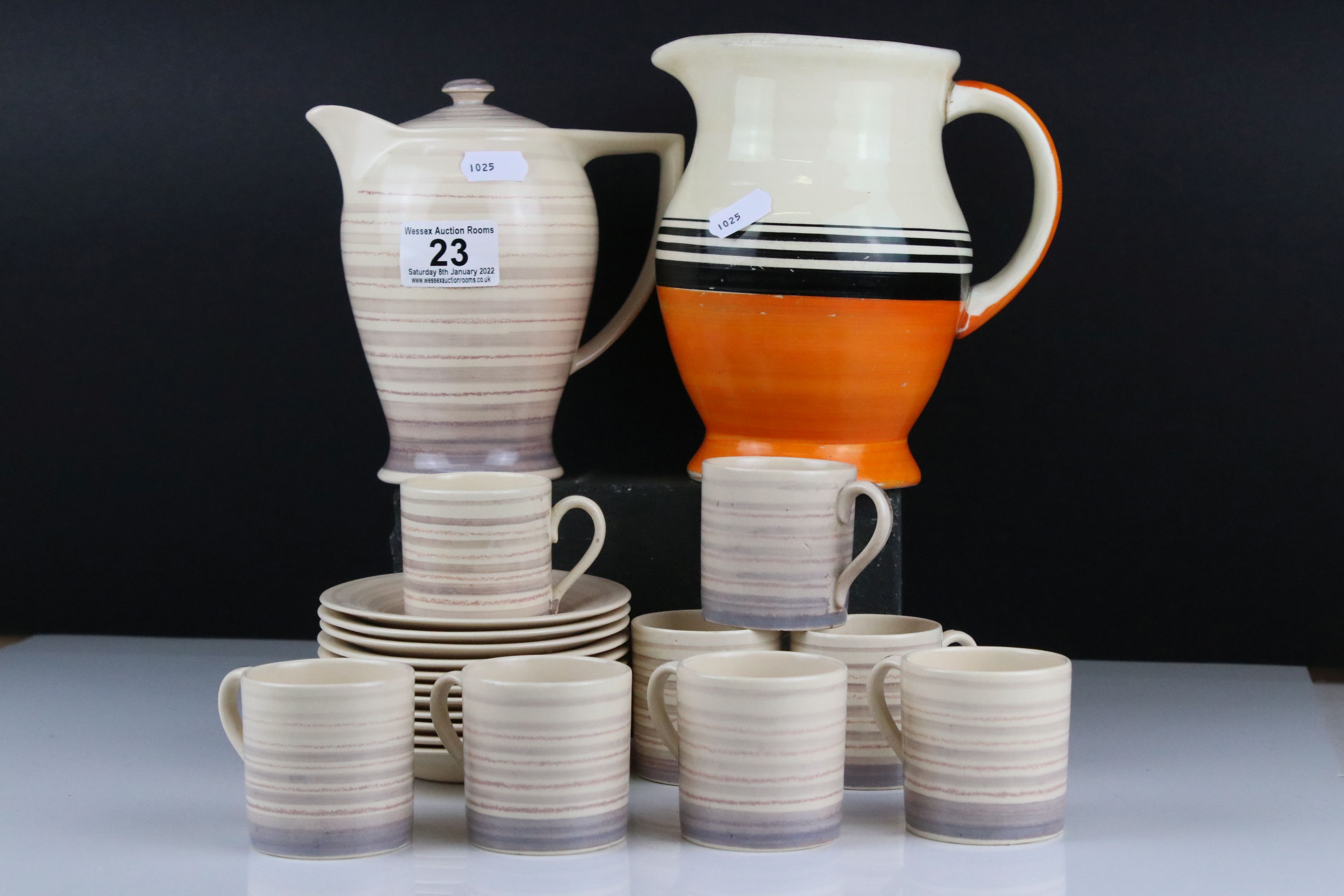 Susie Cooper part Coffee Set decorated with bands on a brown ground comprising Coffee Pot, 8