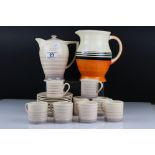 Susie Cooper part Coffee Set decorated with bands on a brown ground comprising Coffee Pot, 8