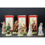 Eight Royal Doulton Bunnykins including Robin Hood, 2 x Maid Marion (one boxed), 2 x Little John (