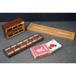 Three vintage cribbage boards & a pack of 1970s American Playboy playing cards