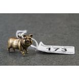 Brass pendant in the form of a pig