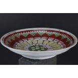Chinese Dish decorated in a red, green and yellow palette, Ming dynasty, 20cms diameter