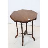 Mahogany table on slender legs with octagonal top