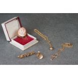 A collection of 9ct gold ladies jewellery to include necklace, brooch and earrings.