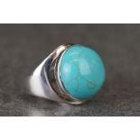Silver ring with large cabochon turquoise stone