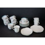 Shelley White Glazed Tea Ware comprising Three Cups, Four Saucers and Three Tea Plates together with