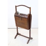 Early 20th century Mahogany Sewing Cabinet with domed glass hinged lid to top opening to a fitted