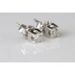 Pair of diamond 18ct white gold stud earrings, round brilliant cut diamond weighing approx 0.25