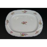 19th century porcelain meat plate with floral decoration, measures approx 50cm.