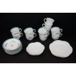 Shelley White Glazed Tea Ware comprising Three Cups, Four Saucers and Three Tea Plates together with