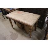 Small Pine Kitchen Table raised on turned legs, 121cms long x 61cms wide x 79cms high