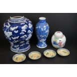 Famille rose Chinese ginger jar decorated with figures in a garden, four oriental dishes, a blue and