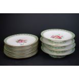 A collection of eleven Brownfield Pottery floral plates together with four match serving plates.
