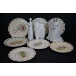 A collection of Royal Daulton to include Bunnykins plates and sculpted figures together with a Royal