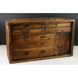 Late 19th / Early 20th century Wooden Engineers Cabinet comprising a bank of drawers and cupboards,