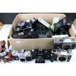 Box of SLR film cameras with lenses, flashes to include Canon, Olympus, Zenit & Rollei