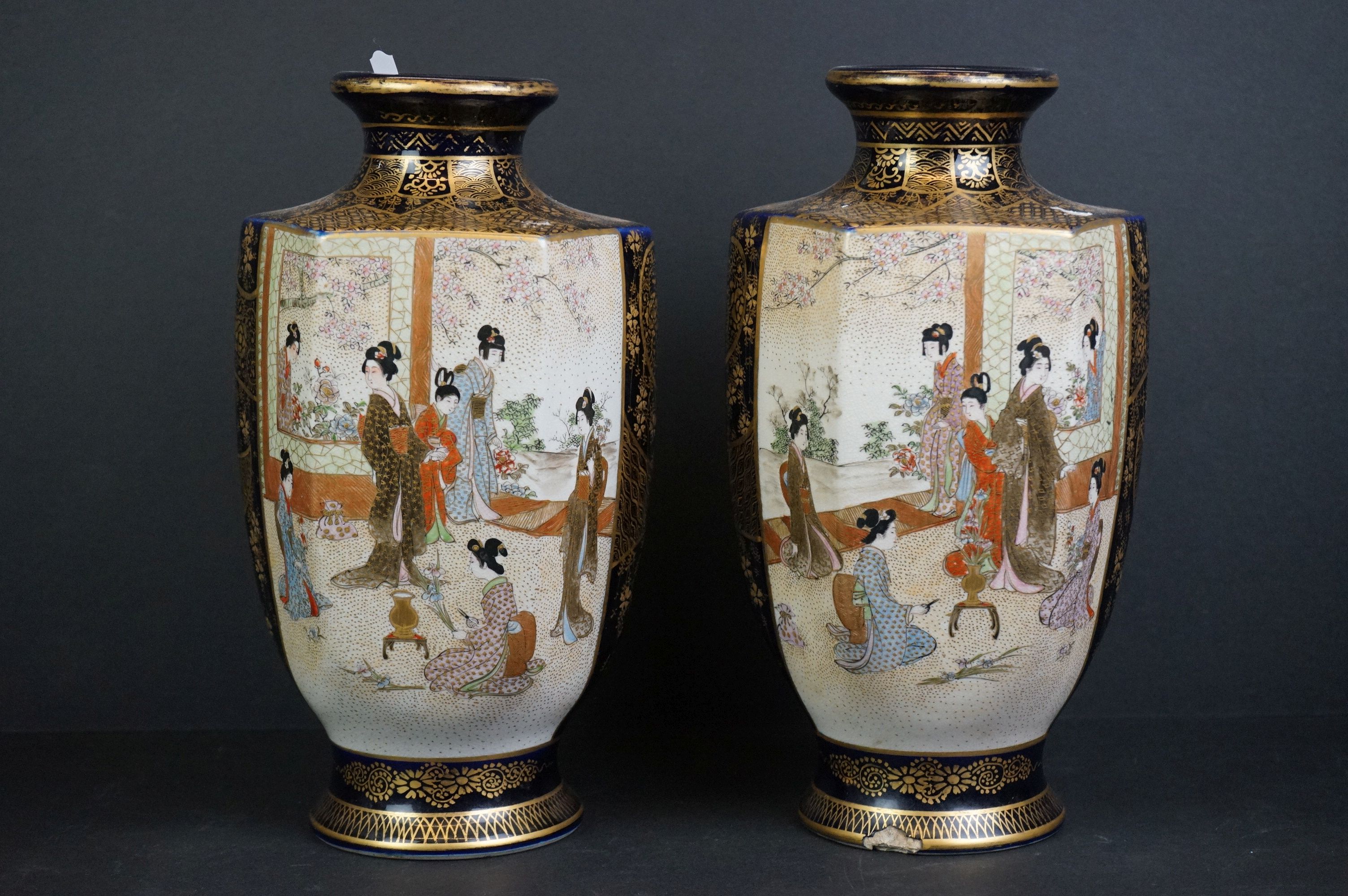 A pair of Japanese satsuma vases with enamel decoration.