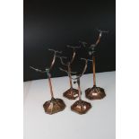 Four copper plated brass extendable shoes display stands, early 20th century, tallest approx. 34cm