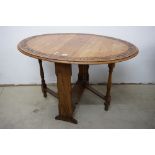 Arts and Crafts Oak Sutherland / Gate-leg Oval Table with carved border, 120cms x 90cms x 75cms high