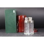 Set of Three Curved Glass and White Metal Spirit Bottles / Hip Flasks contained in a Snake Skin