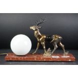 Art Deco style Lamp in the form of a Spelter Stag stood on a Red Marble Base, 38cms long