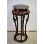 Chinese Hardwood Circular Jardiniere / Plant Stand raised on five carved scrolling supports, 67cms