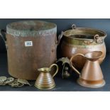 A early 20th century coal bucket together with two copper jugs, horse brasses ..etc.