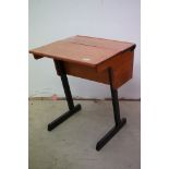 Mid century Pine Child's Desk, the fixed writing surface in front of a hinged lid opening to a well,