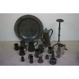 Quantity of old pewter, to include large charger, wrought iron candle stand etc
