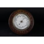 Guinness Advertising - Wooden Cased Circular Aneroid Barometer, inscribed ‘ Lovely Day for a