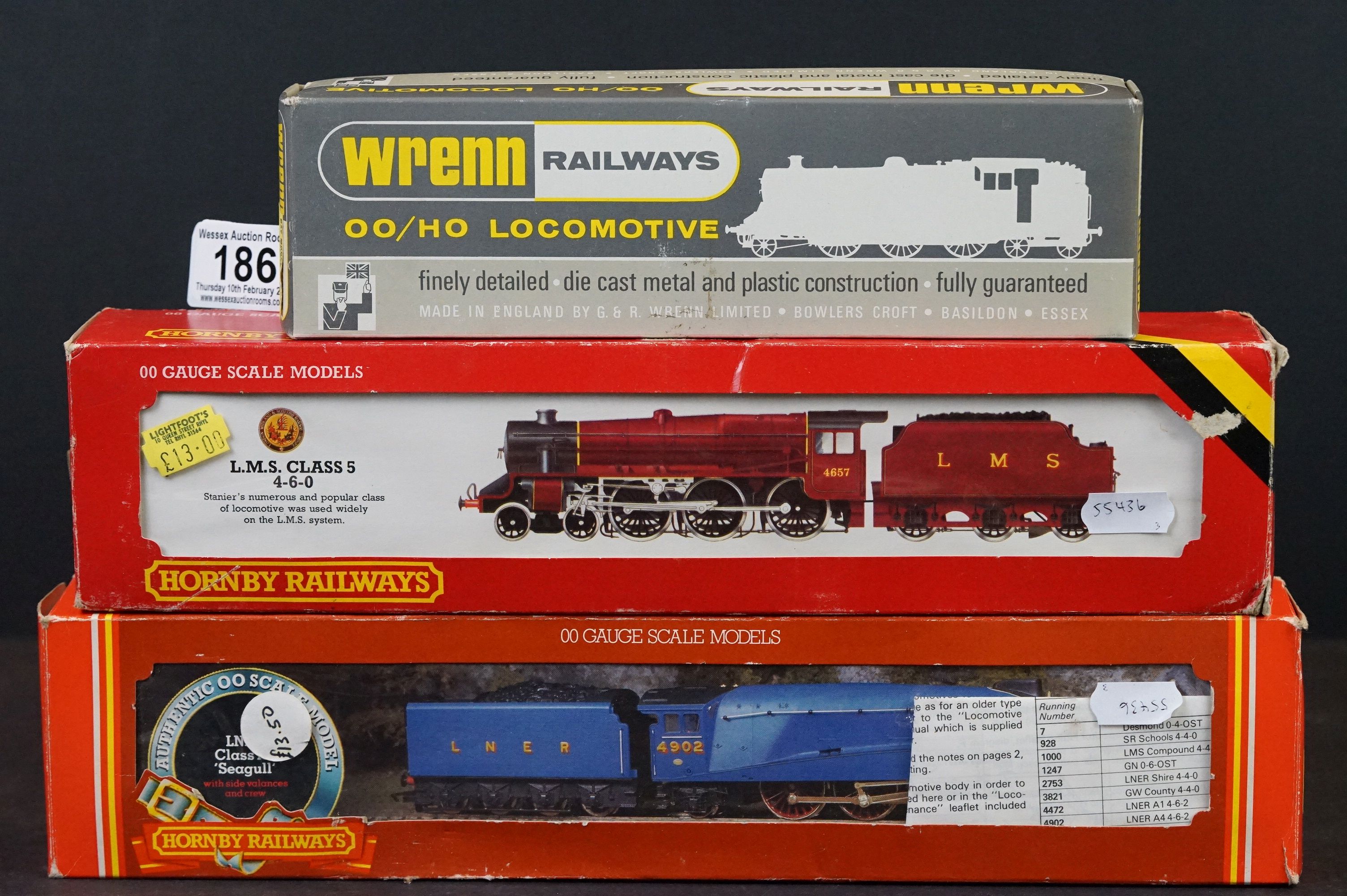 Three boxed OO gauge locomotives to include Wrenn W2201 0-6-0 Tank ESSO and 2 x Hornby (R372 LNER