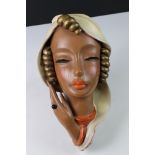 Goldscheider Pottery Face Mask of a Woman, incised number to base 7813 13, 33cms high