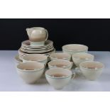 Susie Cooper Art Deco Banded Teaware comprising 5 tea cups and saucers, 2 breakfast cups and