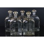 Five Spanish Glass Liquor Decanters and stoppers with gilt decorations marked to base Jerez,