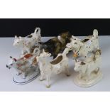 Five Ceramic Cow Creamers including Beswick and 19th century together with a Studio Pottery Bull