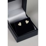 Pair of 9ct yellow gold diamond heart shaped earrings of 22 points