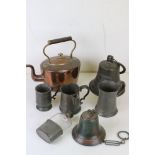 A collection of mixed metal ware to include pewter tankards, copper kettle, Brass bells and a hip