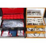 A large collection of mainly vintage costume jewellery contained within two jewellery boxes.